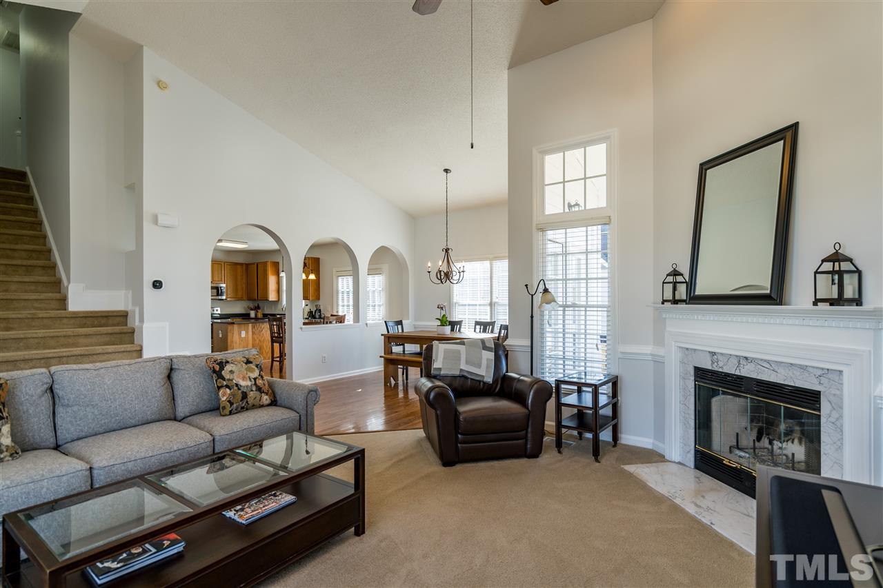 5221 Denmead Way Raleigh, NC 27613 - Photo 8 of 28 Vaulted ceilings, natural light, ceiling fan and open plan!