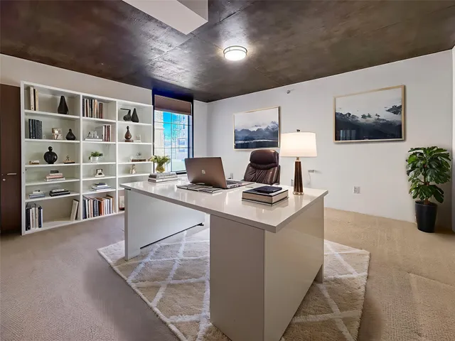 a kitchen with a stove and a refrigerator
