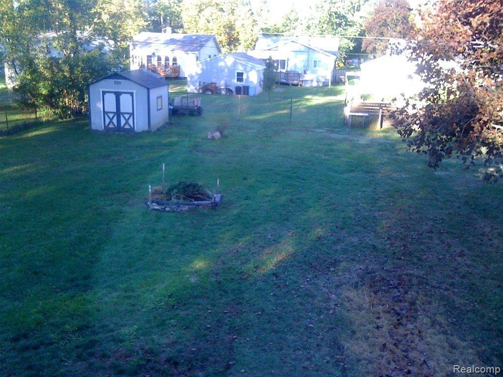 5173 Sashabaw Road Clarkston, MI 48346 - Photo 11 of 11 Large, fenced back yard.jpg