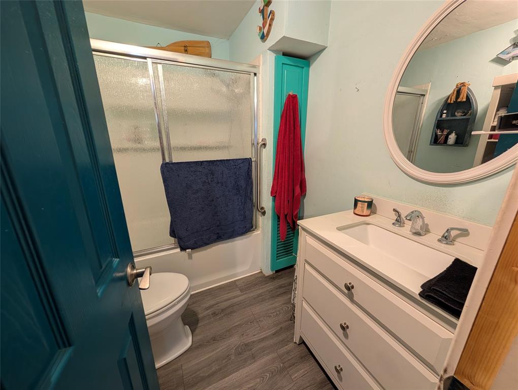 308 Short Street Mansfield, TX 76063 - Photo 13 of 21 a bathroom with a sink a toilet and a mirror