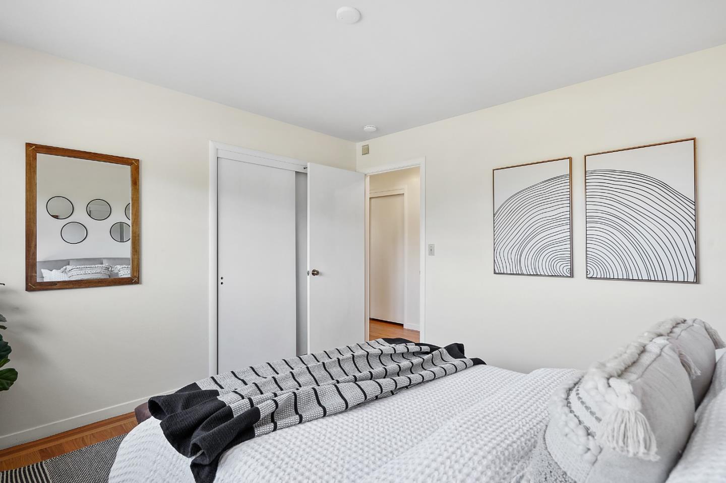 2805 Rivera Drive Burlingame, CA 94010 - Photo 16 of 28 a bedroom with a bed and the wall painting