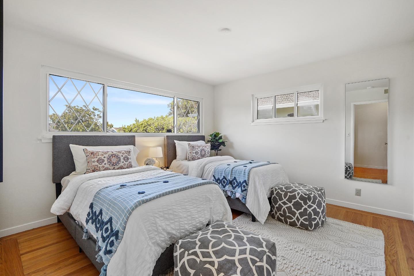 2805 Rivera Drive Burlingame, CA 94010 - Photo 18 of 28 a bedroom with two beds and wooden floor