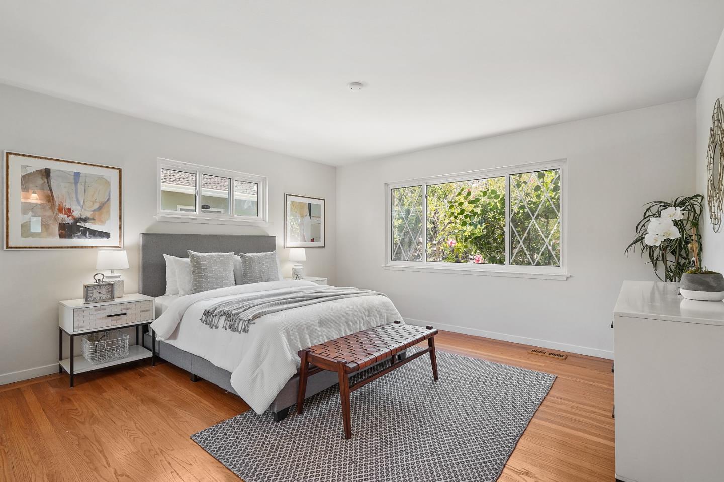 2805 Rivera Drive Burlingame, CA 94010 - Photo 20 of 28 a bedroom with a bed and a window