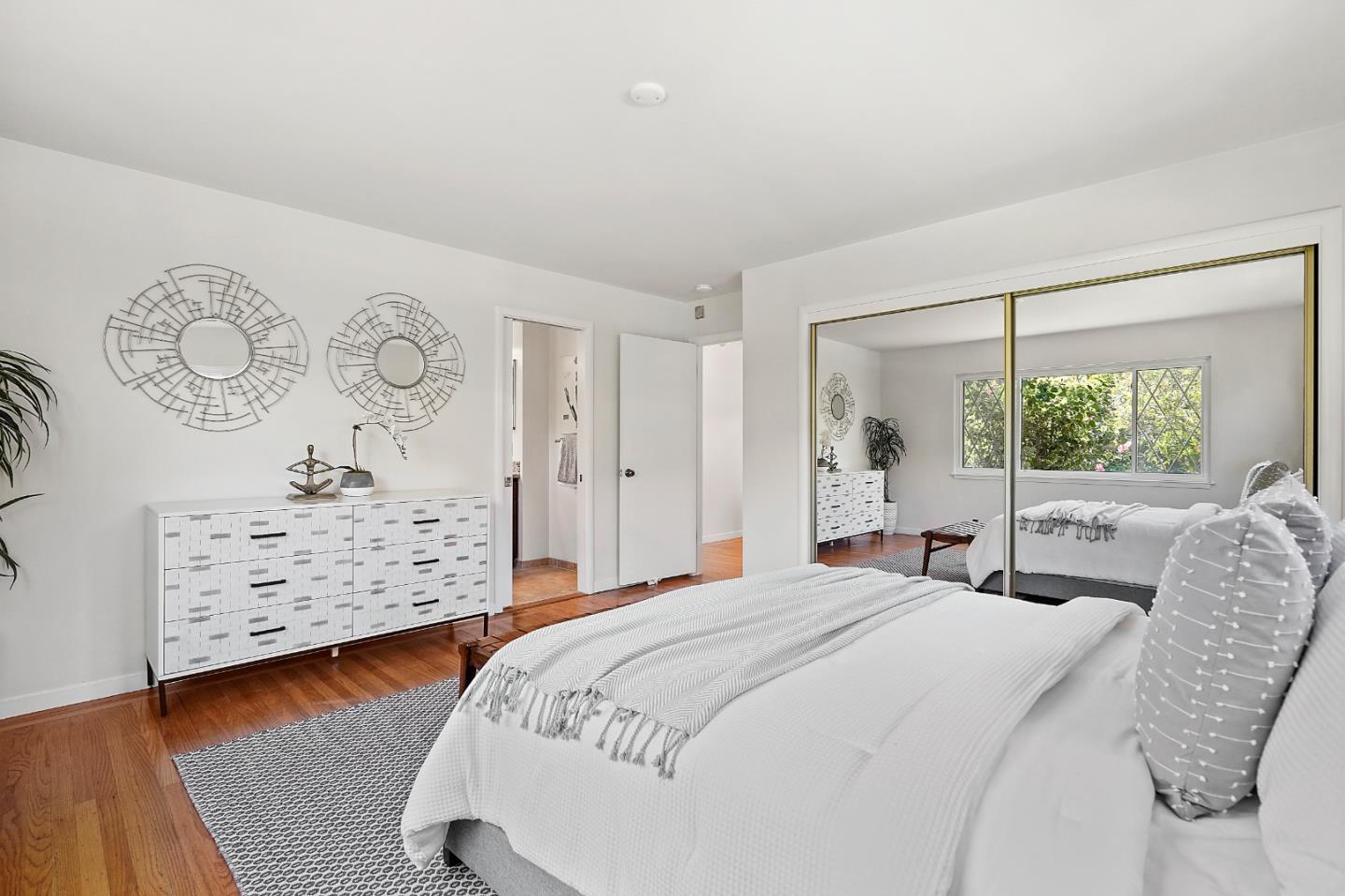 2805 Rivera Drive Burlingame, CA 94010 - Photo 21 of 28 a bedroom with a bed and a window