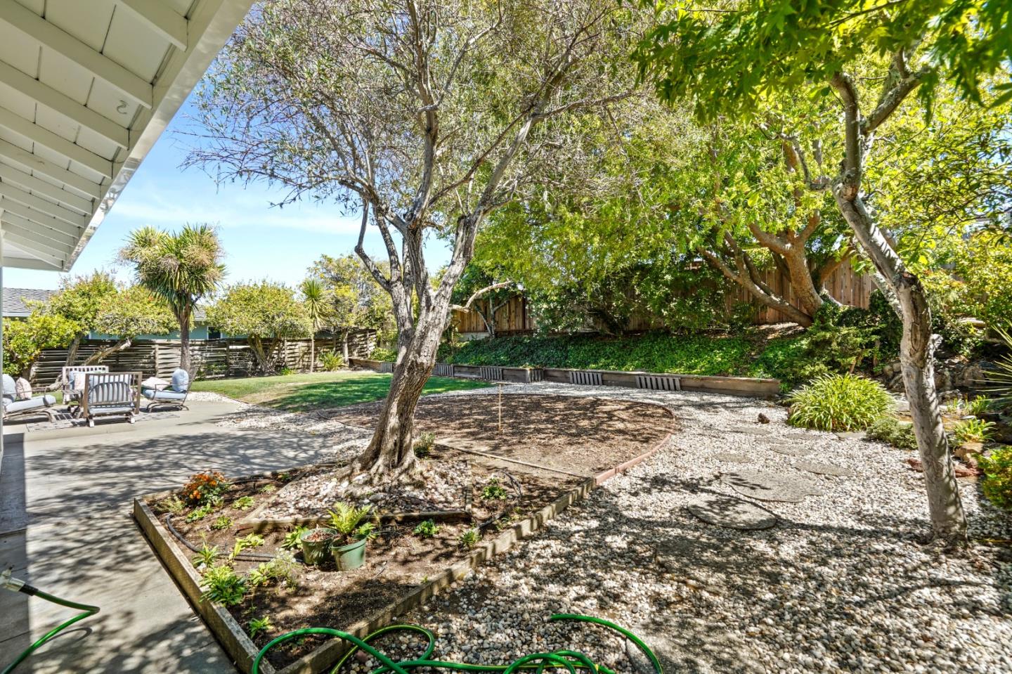 2805 Rivera Drive Burlingame, CA 94010 - Photo 23 of 28 a view of a yard with plants and trees