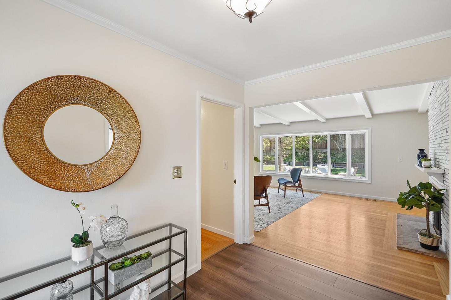 2805 Rivera Drive Burlingame, CA 94010 - Photo 4 of 28 a living room with furniture and a wooden floor