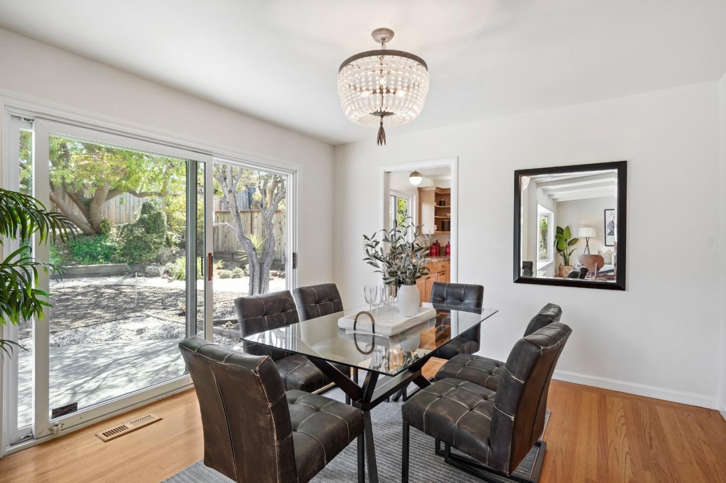 2805 Rivera Drive Burlingame, CA 94010 - Photo 7 of 28 a view of a dining room with furniture window and wooden floor