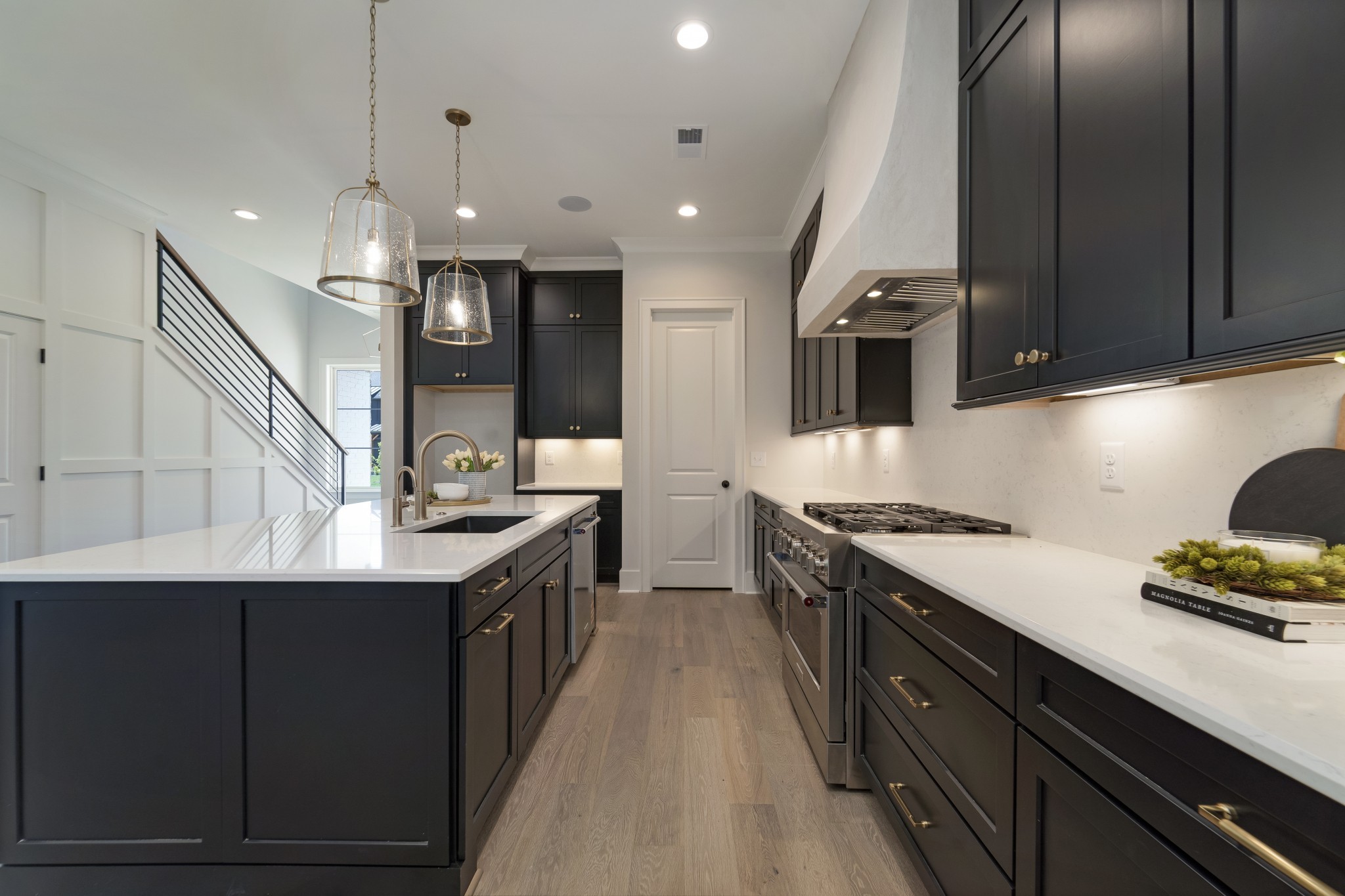 2000 Landry Place Franklin, TN 37064 - Photo 12 of 58 a kitchen with stainless steel appliances granite countertop a sink a stove and a refrigerator