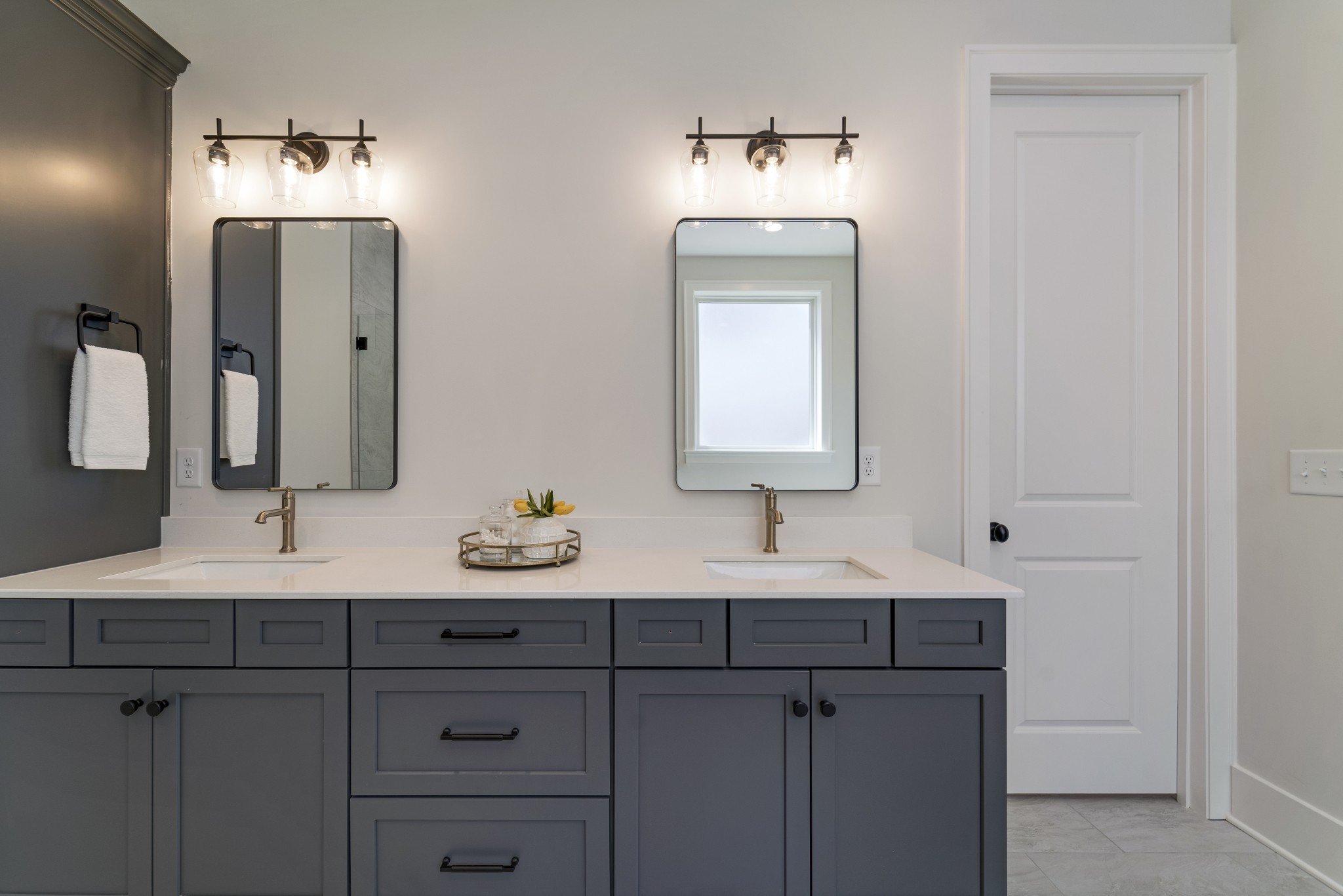 2000 Landry Place Franklin, TN 37064 - Photo 30 of 58 a bathroom with double vanity sinks and a mirror