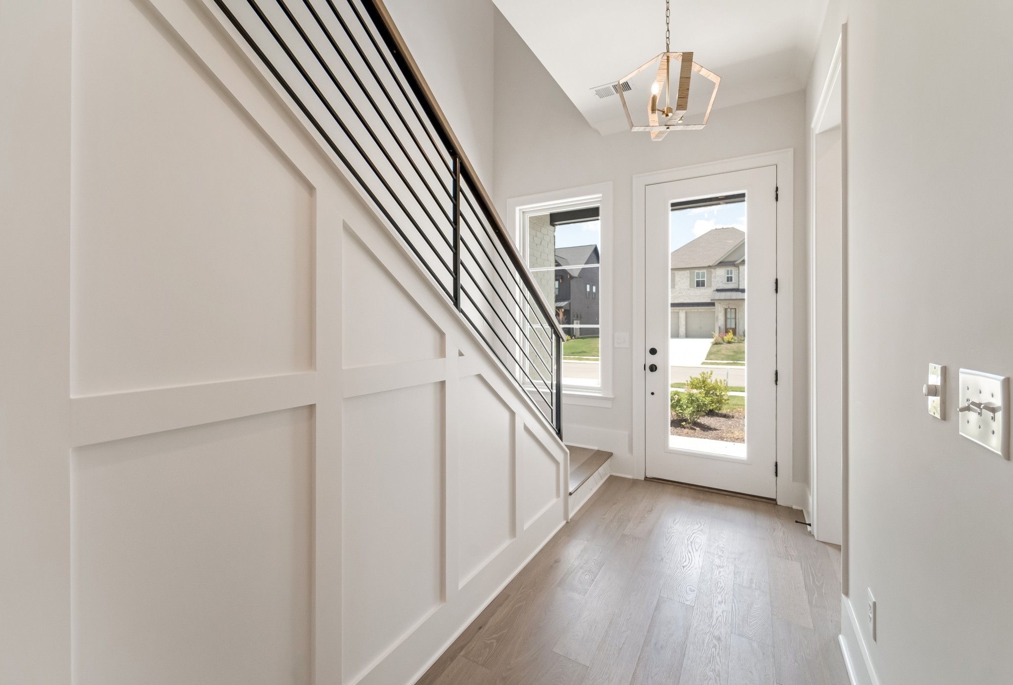 2000 Landry Place Franklin, TN 37064 - Photo 4 of 58 a view of entryway and hall with wooden floor