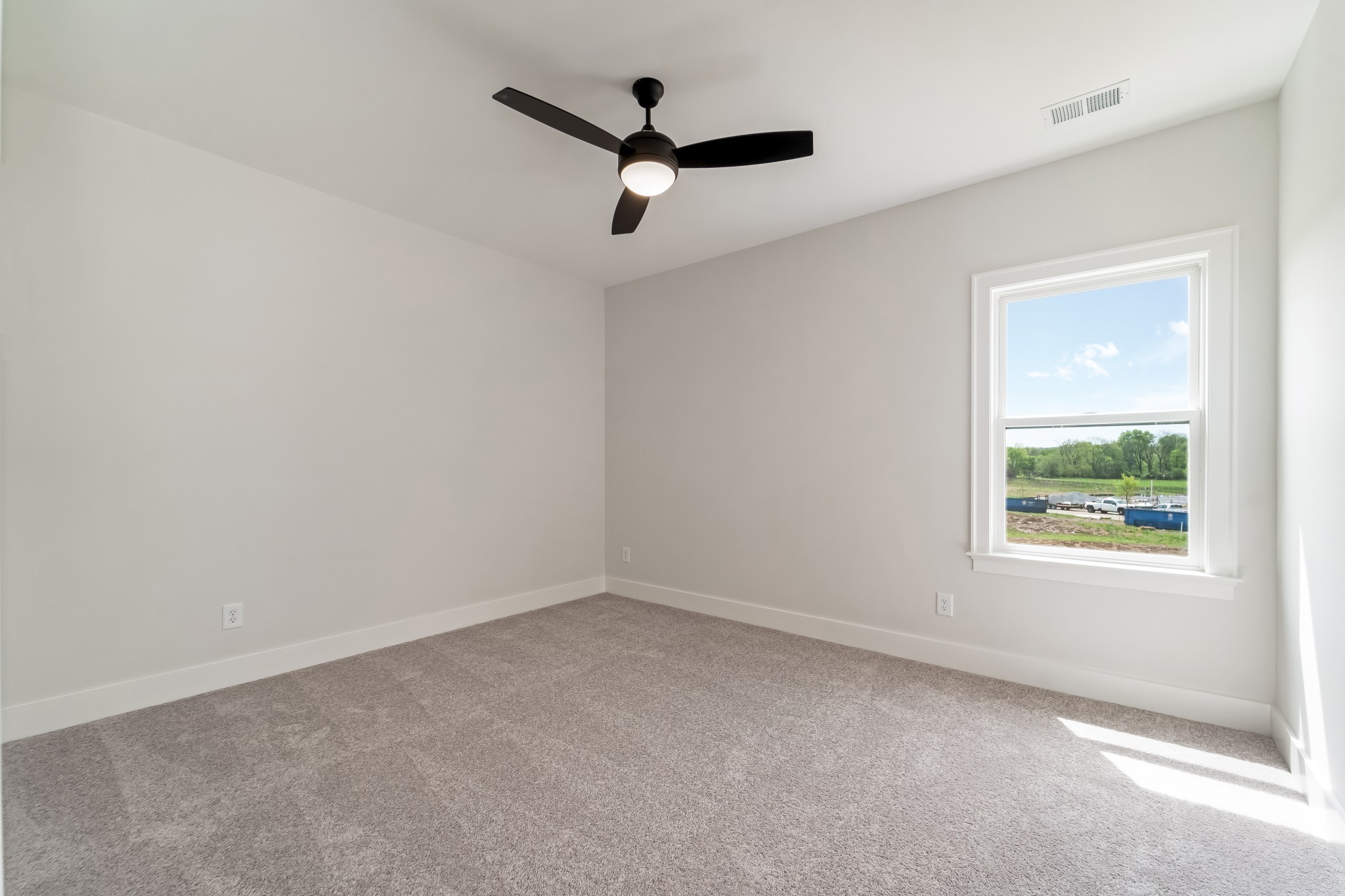 2000 Landry Place Franklin, TN 37064 - Photo 41 of 58 an empty room with ceiling fan and window