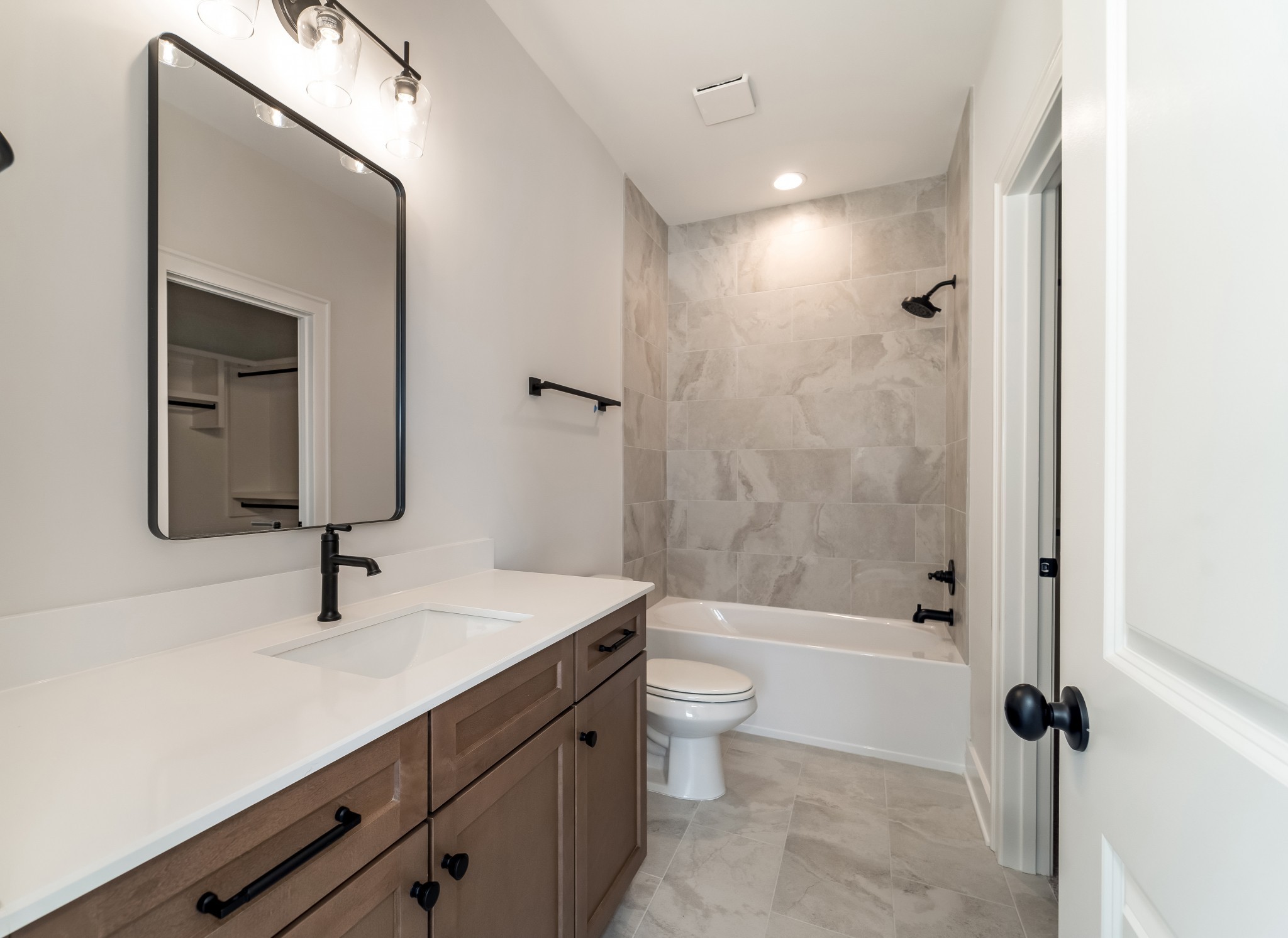 2000 Landry Place Franklin, TN 37064 - Photo 44 of 58 a bathroom with a sink a toilet and shower