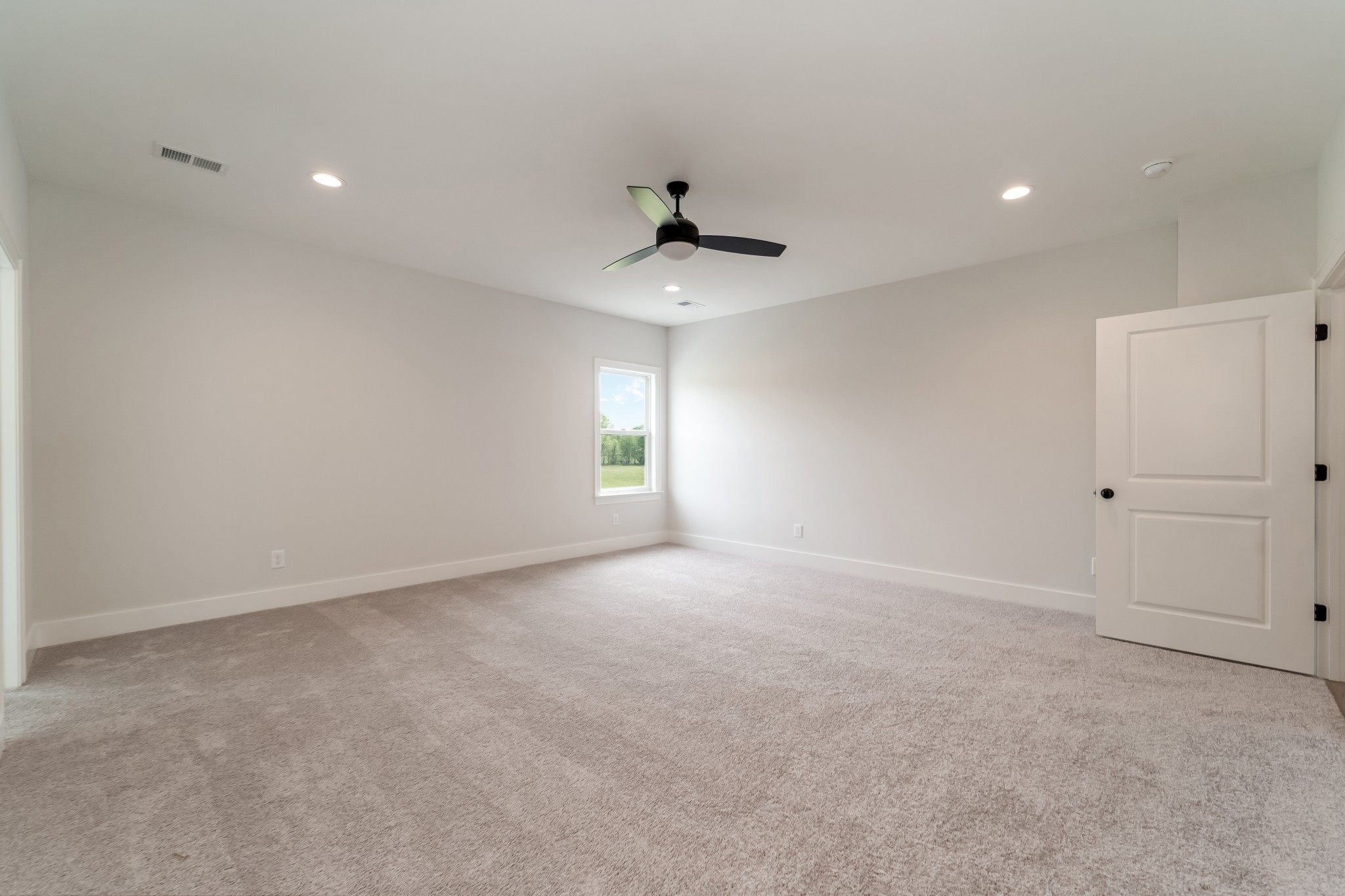 2000 Landry Place Franklin, TN 37064 - Photo 46 of 58 an empty room with a ceiling fan and windows