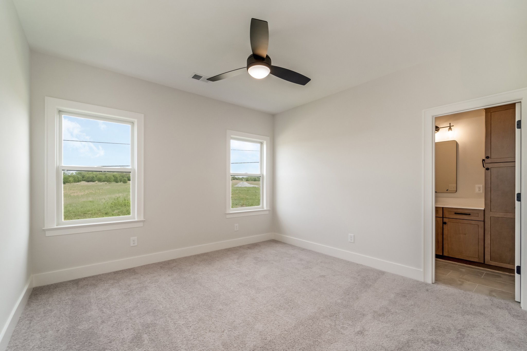 2000 Landry Place Franklin, TN 37064 - Photo 47 of 58 an empty room with windows and closet