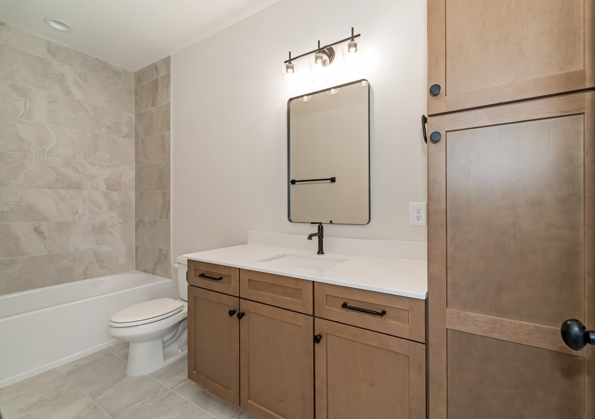2000 Landry Place Franklin, TN 37064 - Photo 48 of 58 a bathroom with a granite countertop sink toilet and shower
