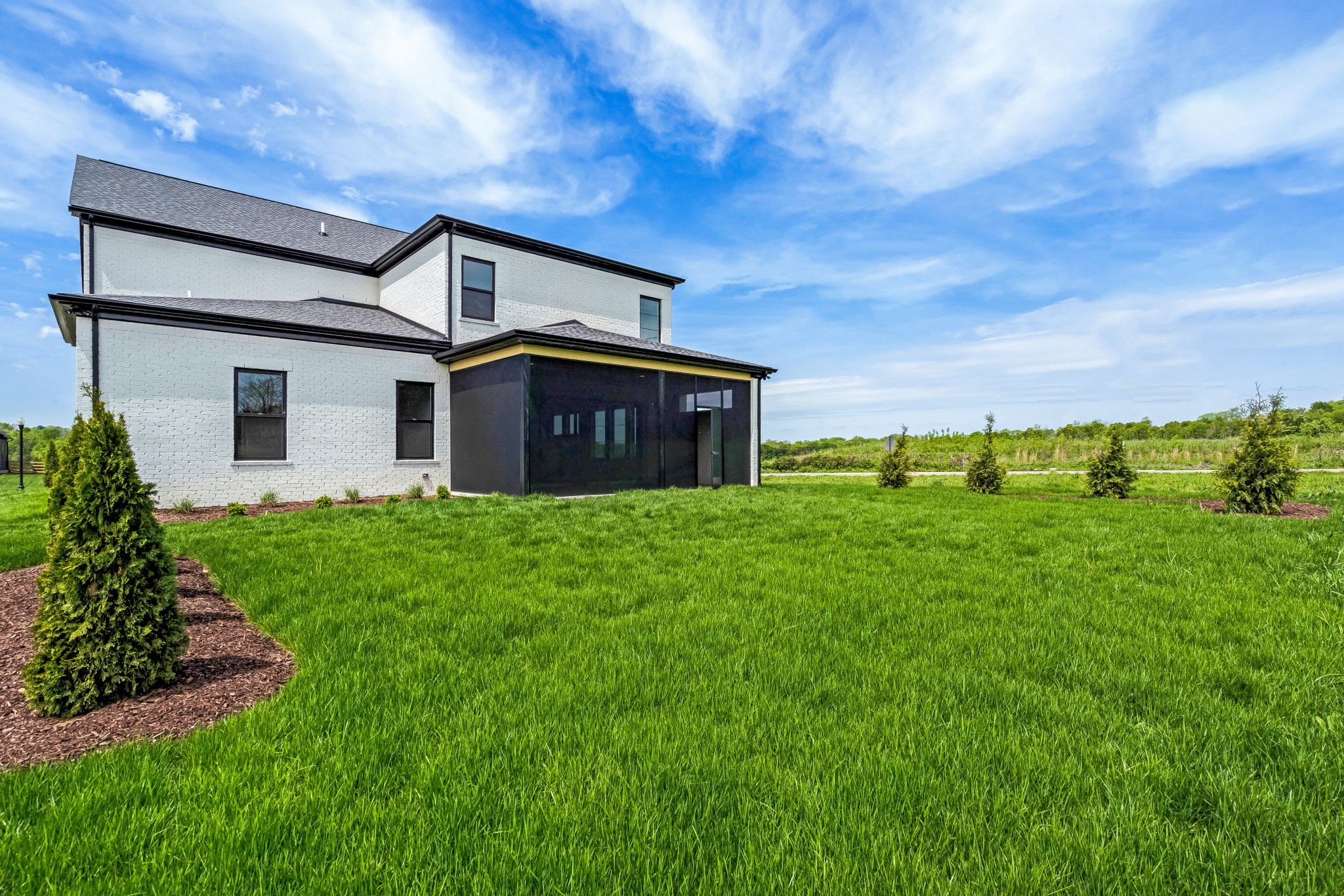 2000 Landry Place Franklin, TN 37064 - Photo 58 of 58 a view of a house with a big yard potted plants and large tree