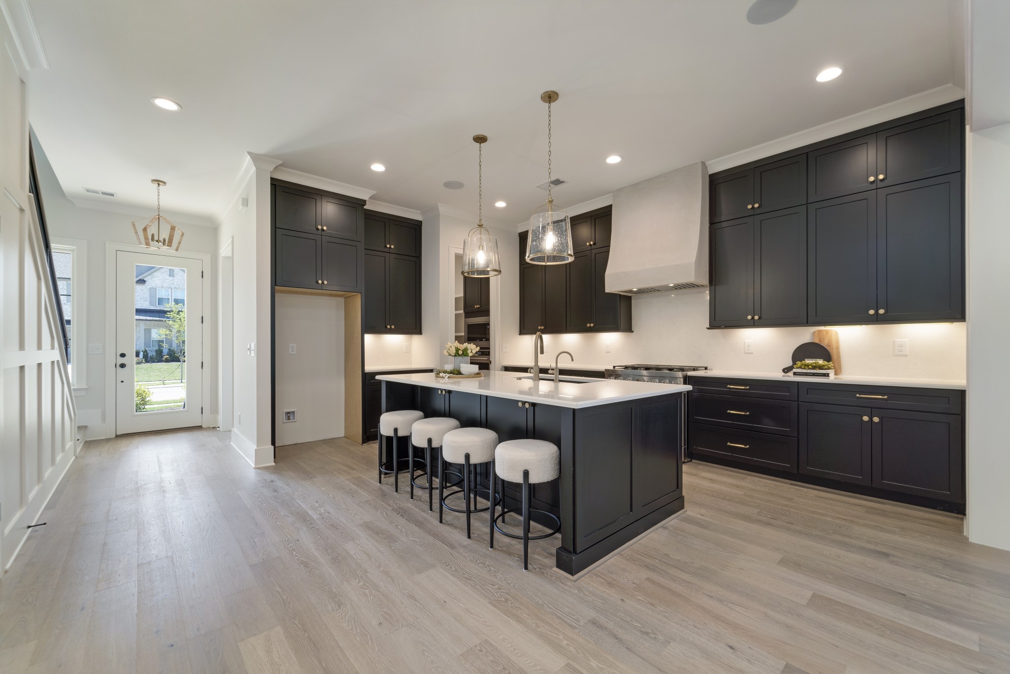 2000 Landry Place Franklin, TN 37064 - Photo 8 of 58 a large kitchen with stainless steel appliances granite countertop a lot of cabinets and wooden floor