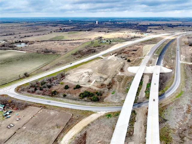 a view of a balcony with an ocean view