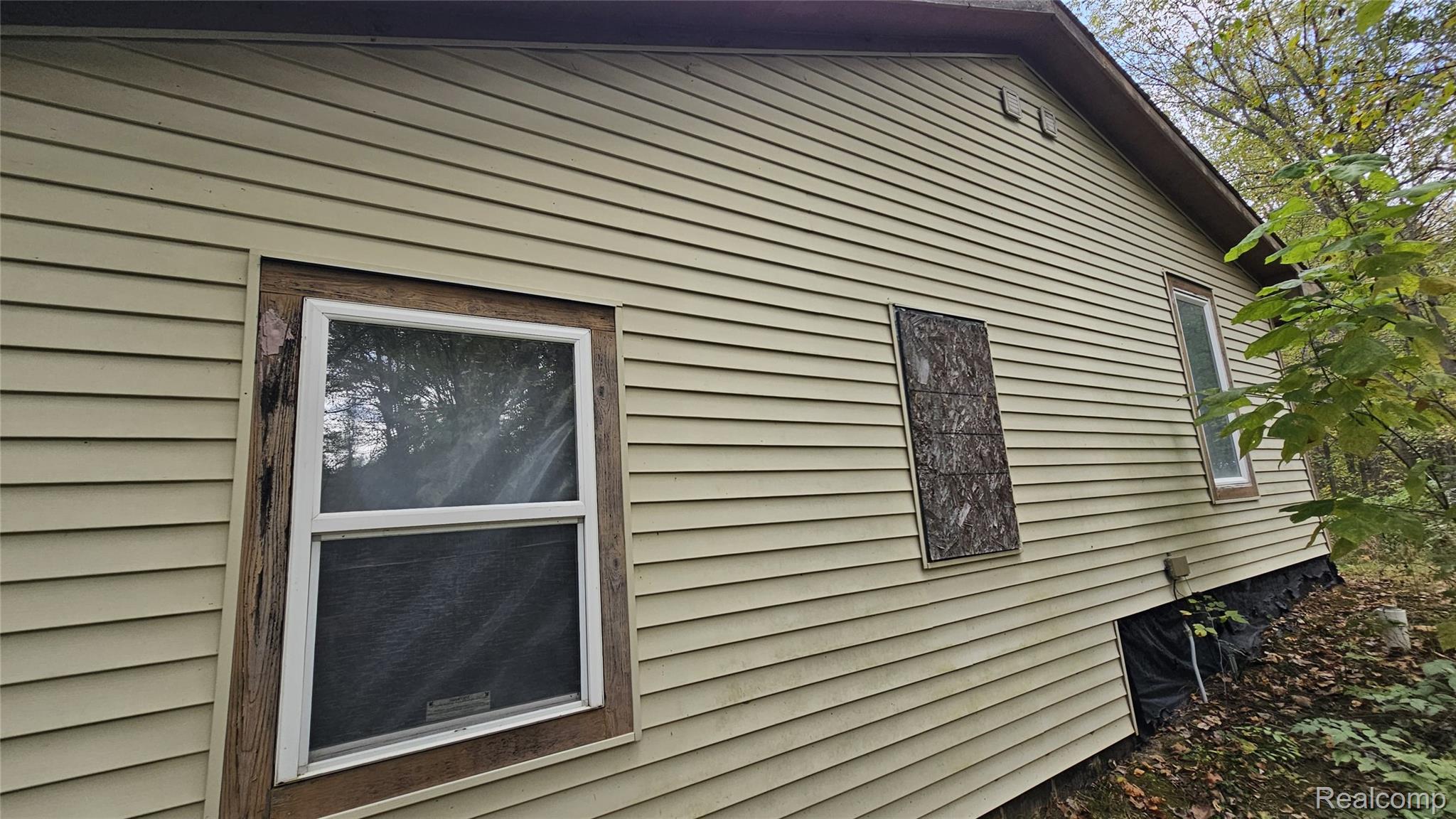 37 Risch Road North Webberville, MI 48892 - Photo 19 of 20 View of side of home