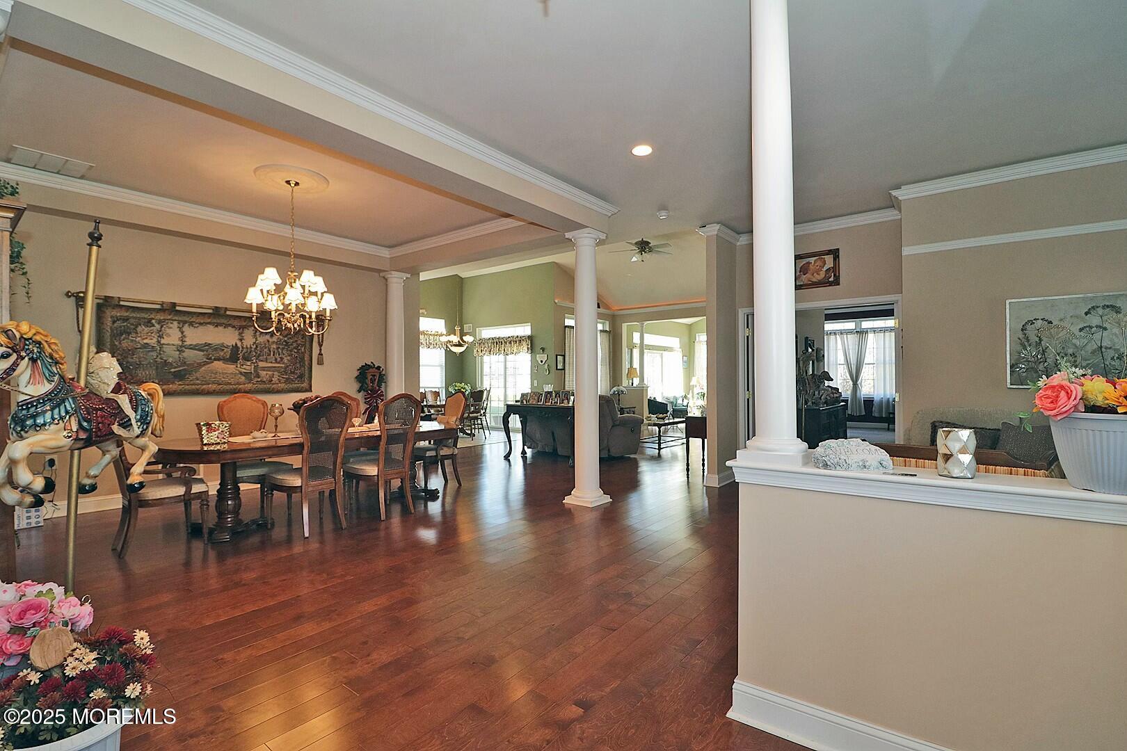 2 Manasquan Road Waretown, NJ 08758 - Photo 12 of 91 a lobby with furniture and lots of potted plants