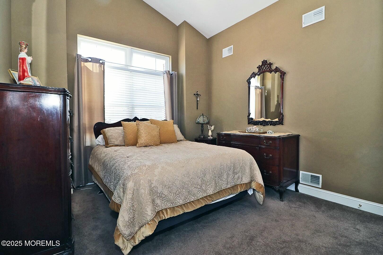 2 Manasquan Road Waretown, NJ 08758 - Photo 32 of 91 a bedroom with a bed and window