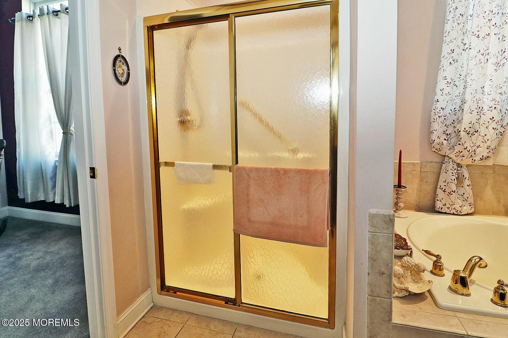 2 Manasquan Road Waretown, NJ 08758 - Photo 40 of 91 a view of a bathroom with shower and a door
