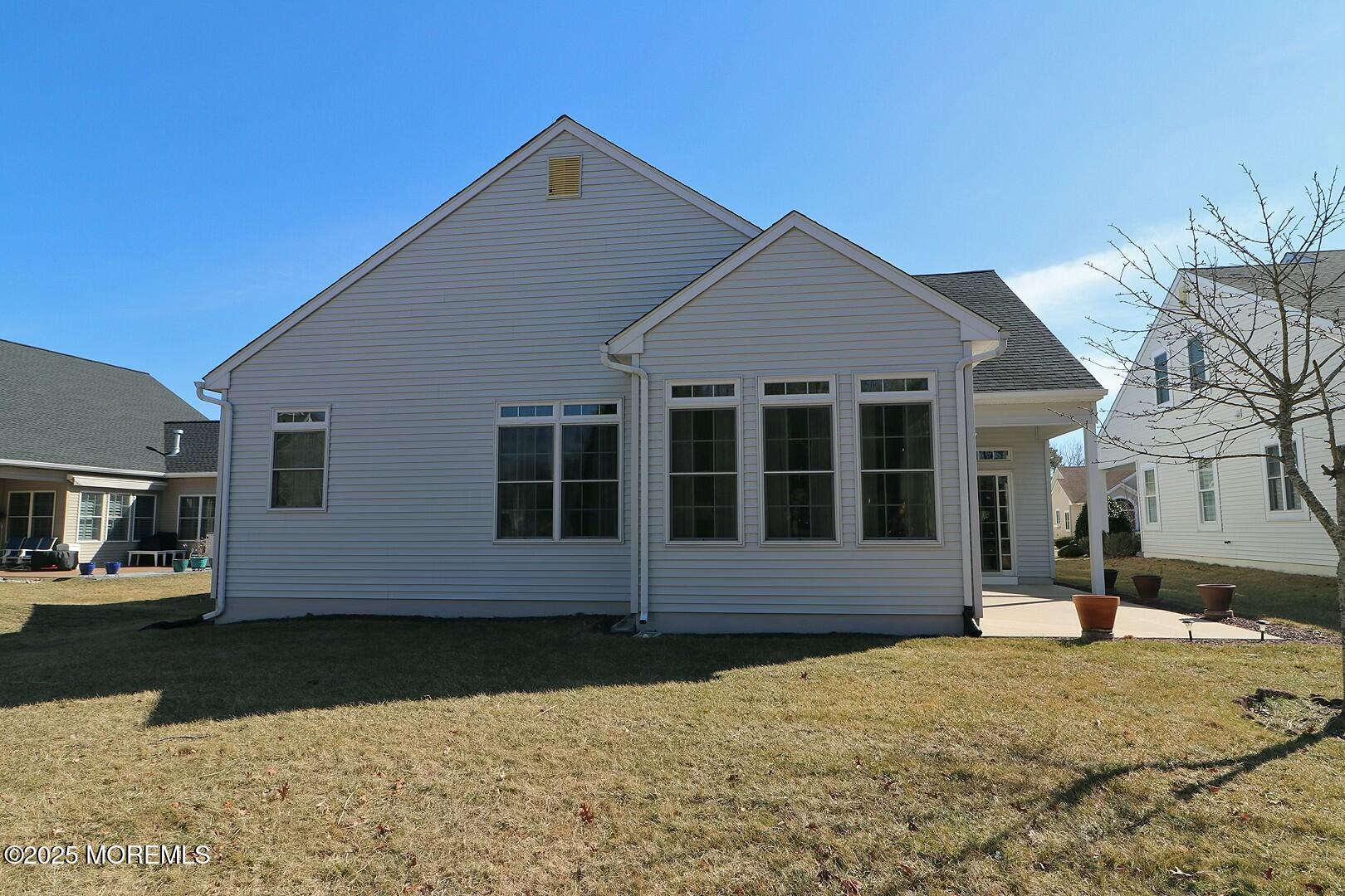 2 Manasquan Road Waretown, NJ 08758 - Photo 41 of 91 a front view of a house with a yard