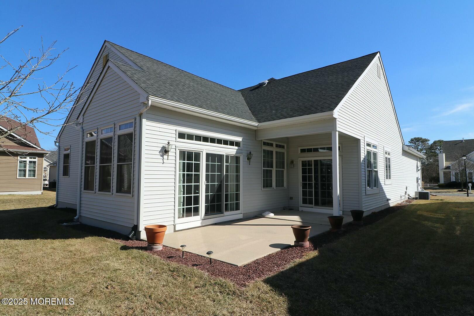 2 Manasquan Road Waretown, NJ 08758 - Photo 42 of 91 a view of a house with backyard and garden