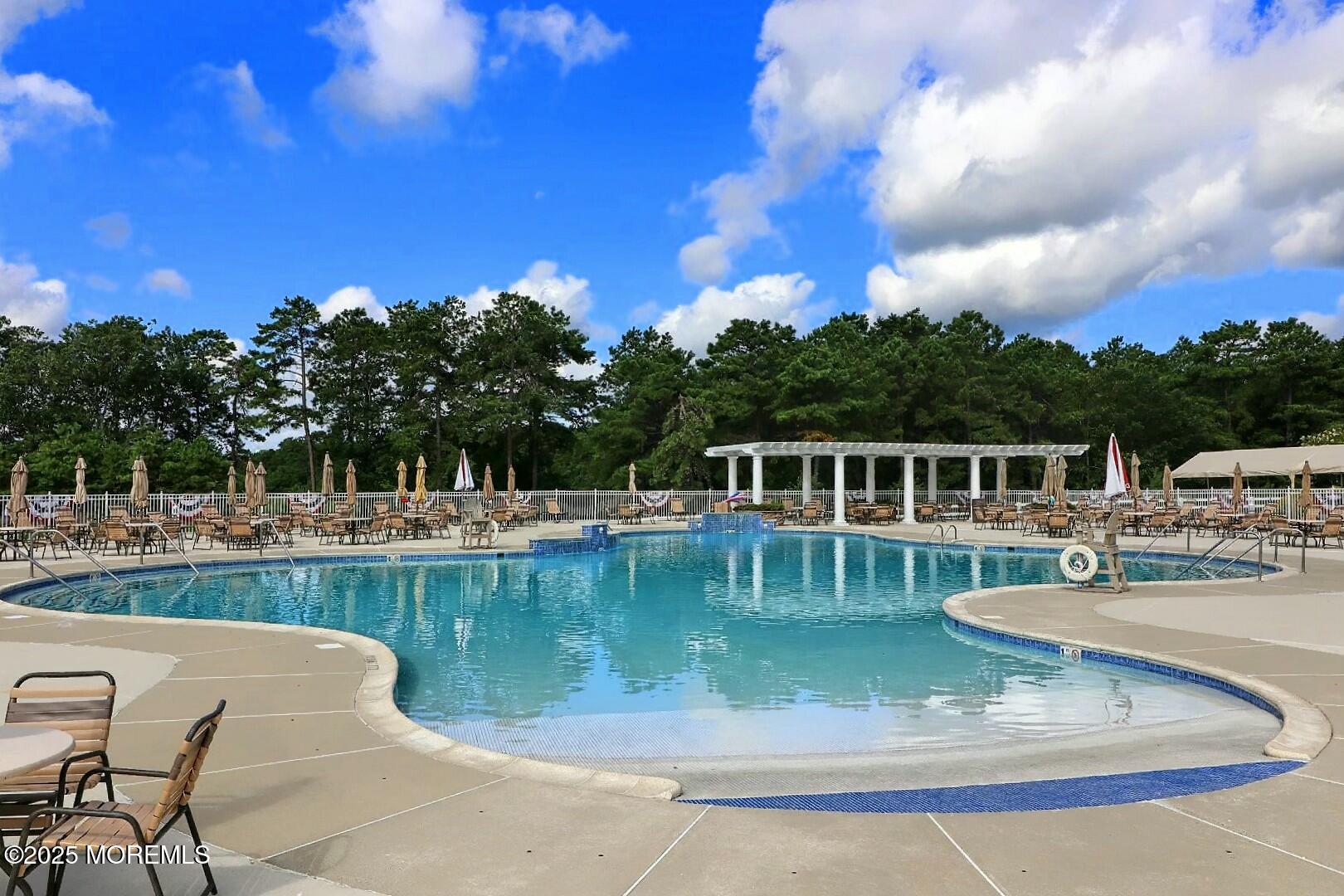 2 Manasquan Road Waretown, NJ 08758 - Photo 56 of 91 a view of a house with pool and a yard
