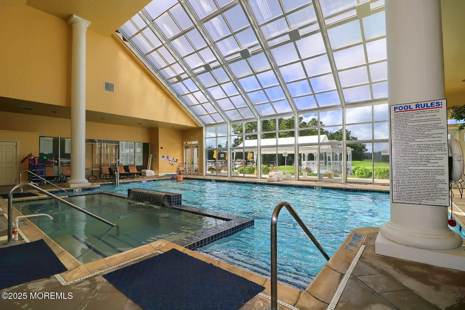 2 Manasquan Road Waretown, NJ 08758 - Photo 61 of 91 a view of a swimming pool with seating area