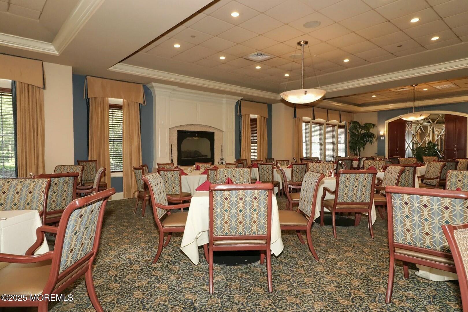 2 Manasquan Road Waretown, NJ 08758 - Photo 69 of 91 a living room with furniture a flat screen tv and a dining table