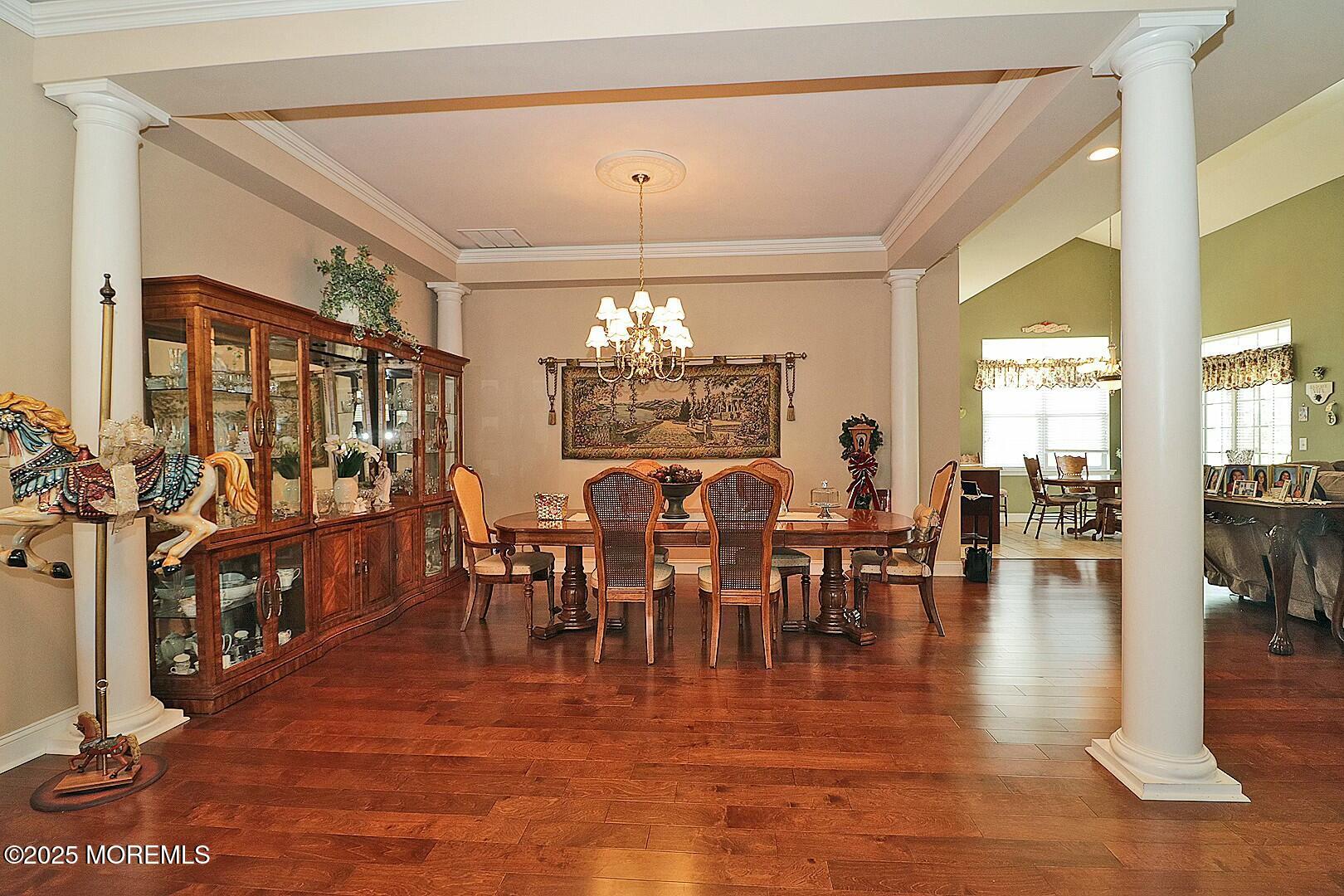 2 Manasquan Road Waretown, NJ 08758 - Photo 8 of 91 a view of a dining room with furniture window and wooden floor