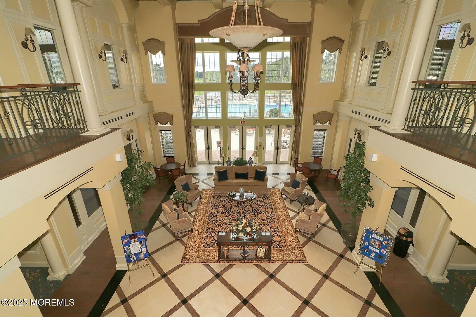 2 Manasquan Road Waretown, NJ 08758 - Photo 83 of 91 a view of a living room with a floor to ceiling window and fireplace