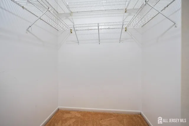 a view of a room with racks on the wall