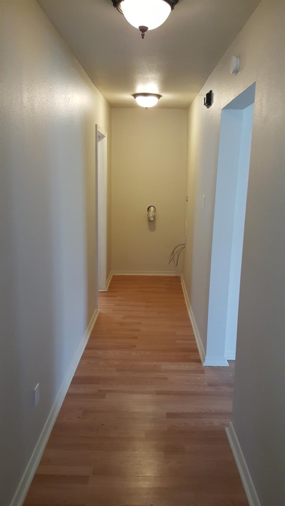 1807 18th Street Lubbock, TX 79401 - Photo 11 of 27 a view of a room with wooden floor