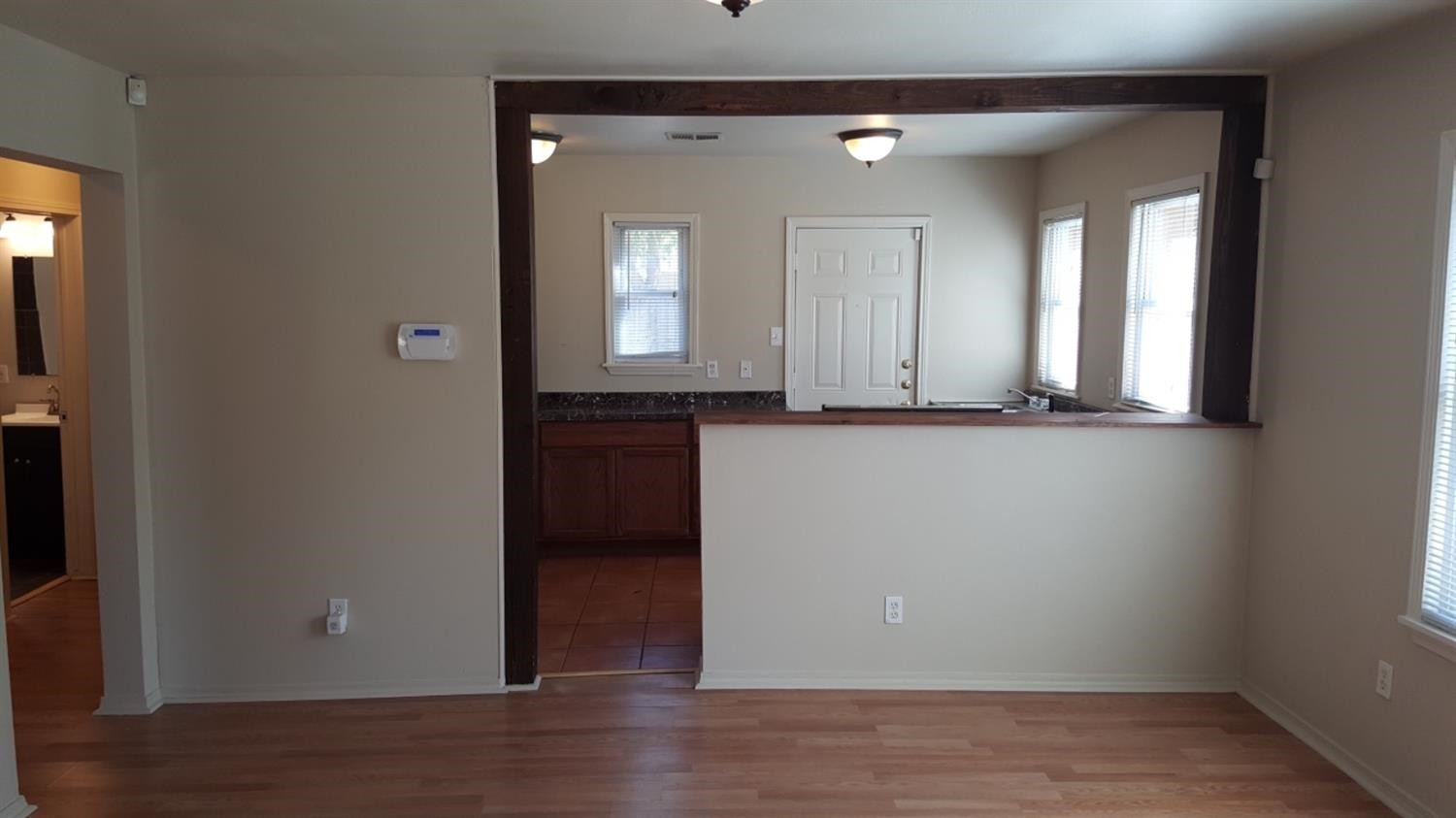 1807 18th Street Lubbock, TX 79401 - Photo 18 of 27 wooden floor and window in a room
