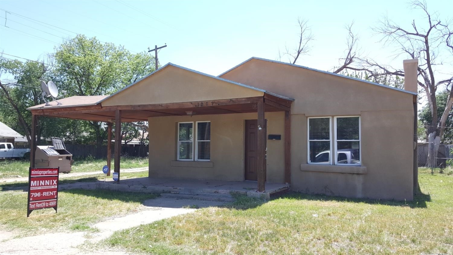 1807 18th Street Lubbock, TX 79401 - Photo 21 of 27 a view of a house with a yard