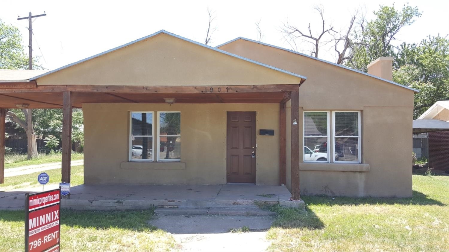 1807 18th Street Lubbock, TX 79401 - Photo 27 of 27 a front view of a house with a yard