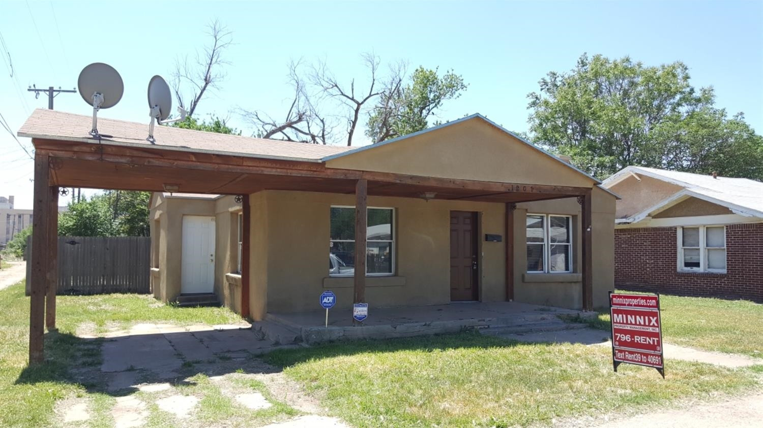 1807 18th Street Lubbock, TX 79401 - Photo 10 of 27 a front view of a house with garden