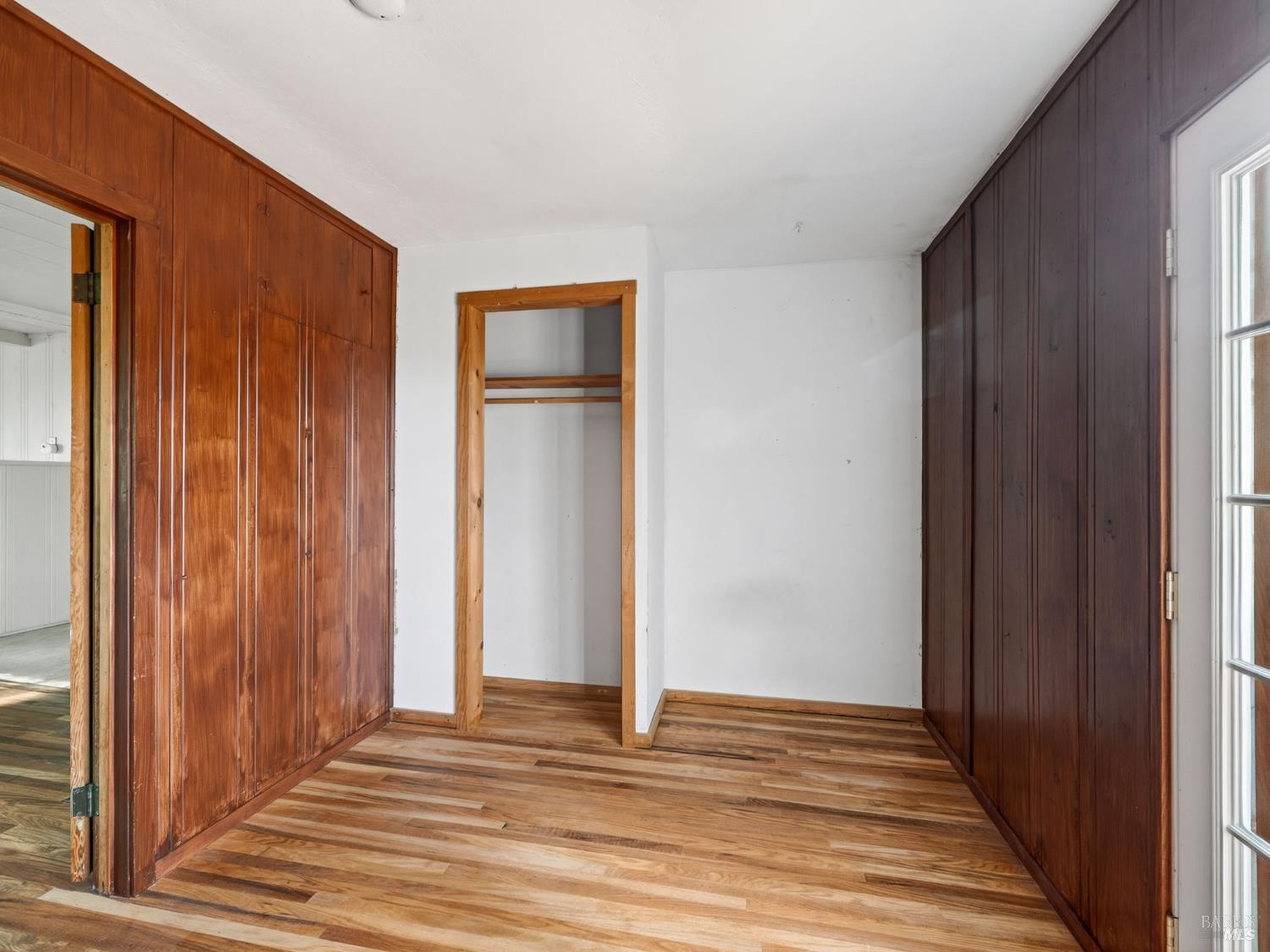 10701 Orr Springs Road Ukiah, CA 95482 - Photo 21 of 52 a view of a livingroom with wooden floor and closet