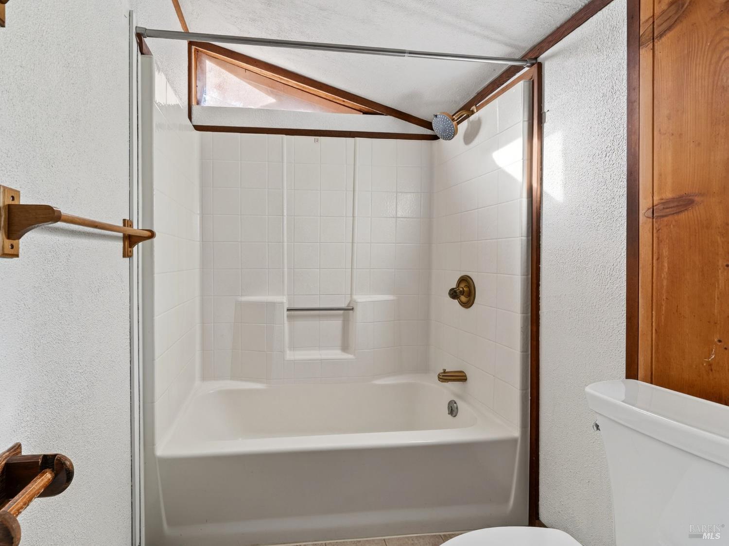 10701 Orr Springs Road Ukiah, CA 95482 - Photo 23 of 52 a bathroom with a bathtub and a shower