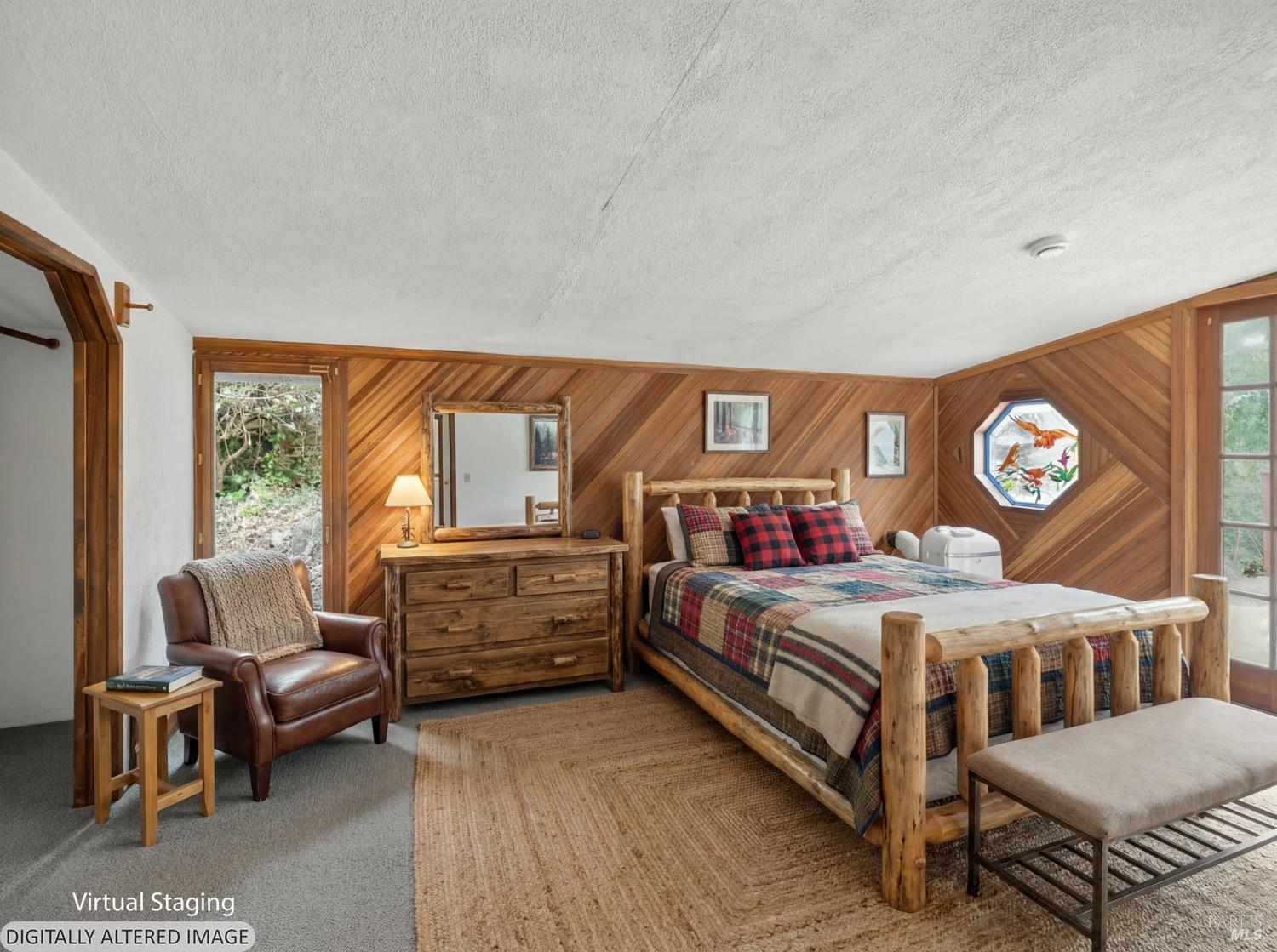 10701 Orr Springs Road Ukiah, CA 95482 - Photo 7 of 52 a bedroom with a bed and a large window