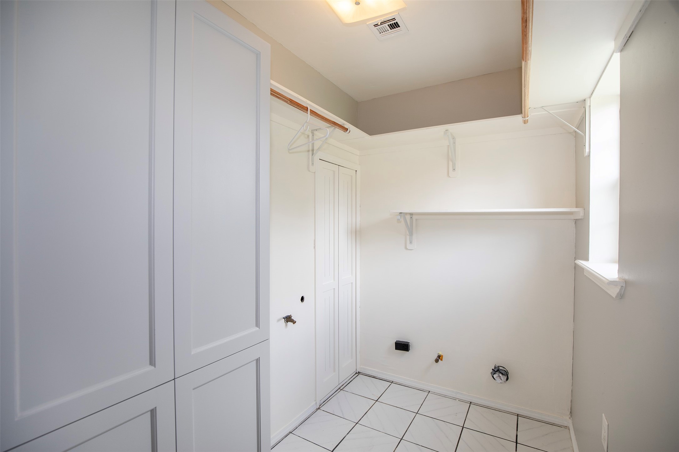 5535 Allendale Road Houston, TX 77017 - Photo 12 of 29 The utility room has terrific storage space.