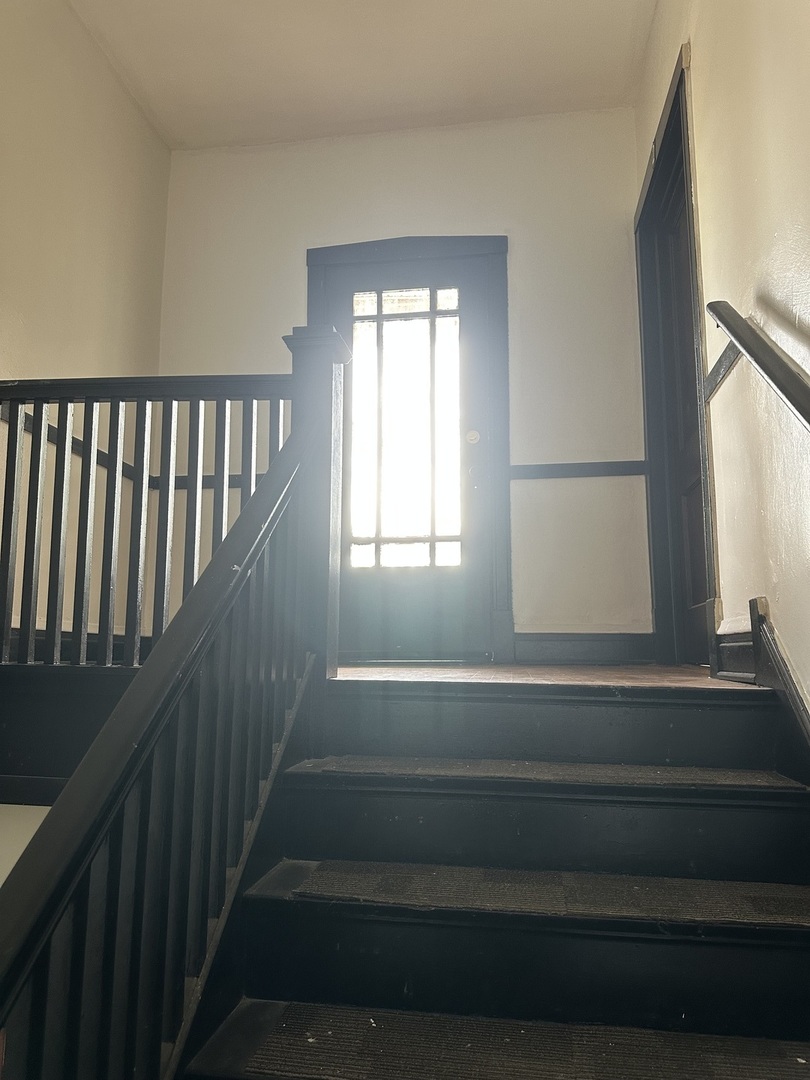 6546 South Rockwell Street, Unit 2 Chicago, IL 60629 - Photo 4 of 11 a view of entryway and hall with wooden floor
