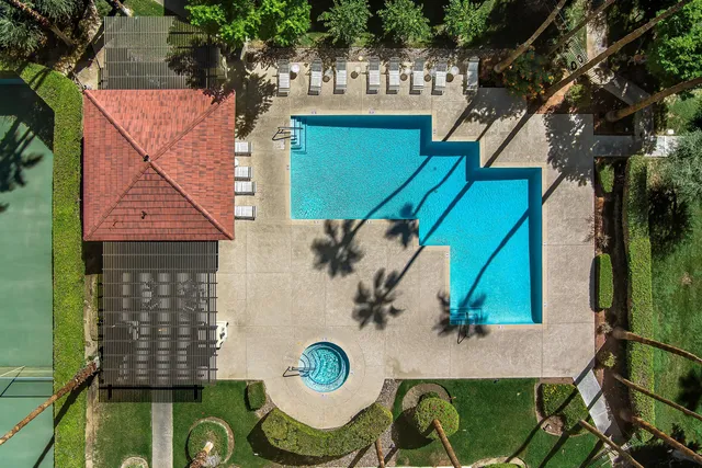 a view of a house with swimming pool