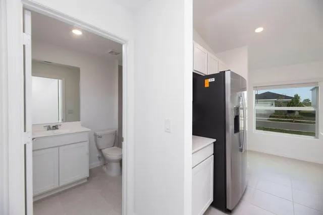 a bathroom with a toilet and a sink