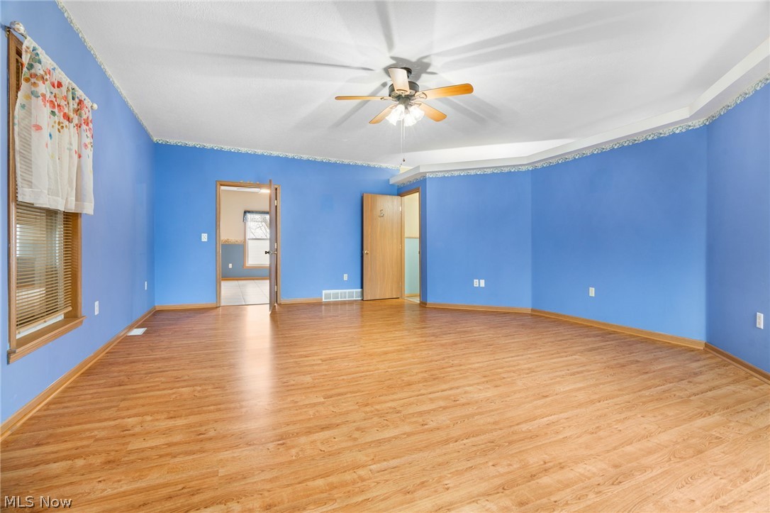 1640 Old Delaware Road Mount Vernon, OH 43050 - Photo 20 of 49 Unfurnished bedroom with light wood-style floors and ceiling fan