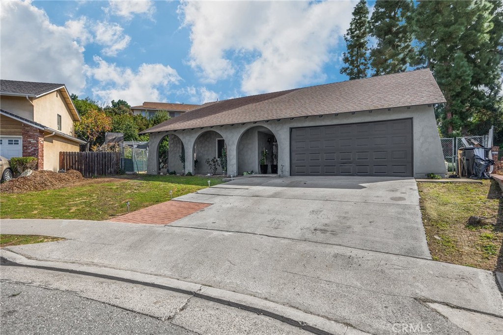 358 Lotus Place Brea, CA 92821 - Photo 1 of 31 a front view of house with yard and trees around