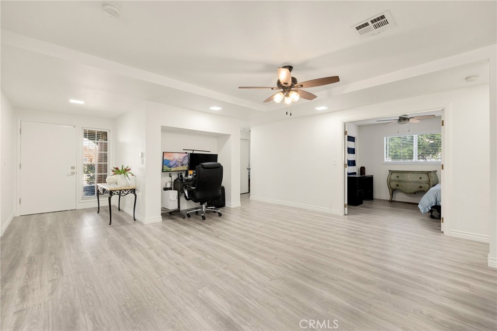 358 Lotus Place Brea, CA 92821 - Photo 11 of 31 a view of a livingroom with furniture and a ceiling fan
