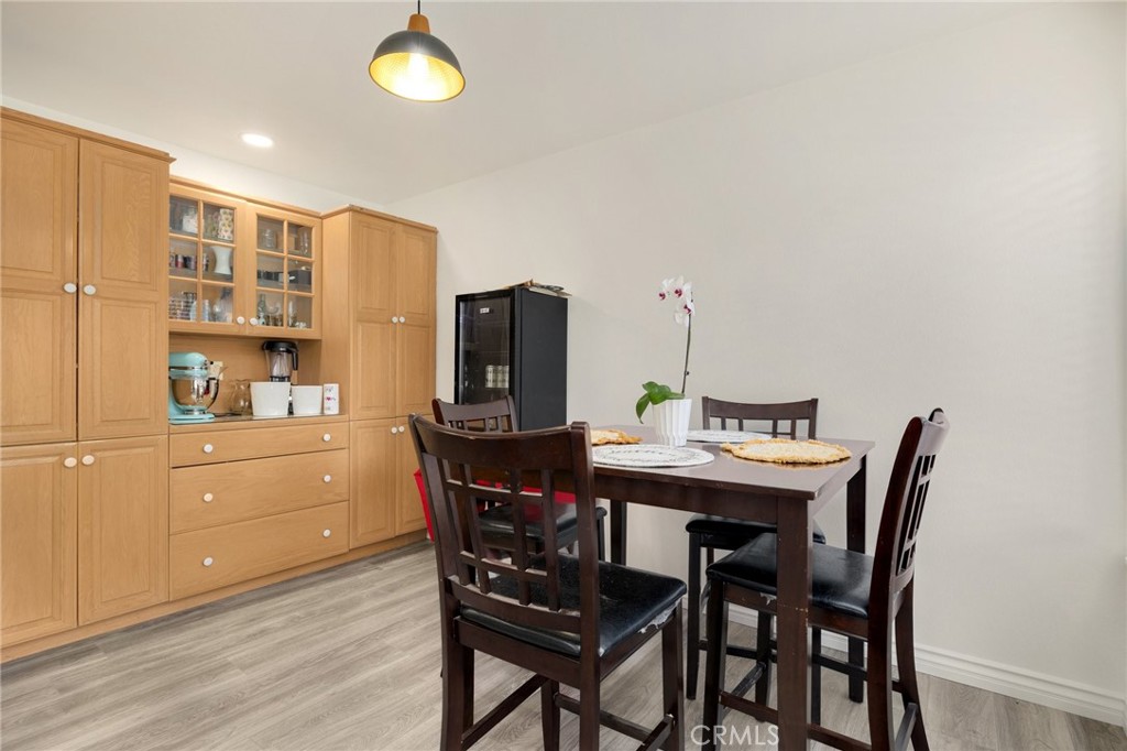 358 Lotus Place Brea, CA 92821 - Photo 16 of 31 a view of a dining room with furniture and wooden floor